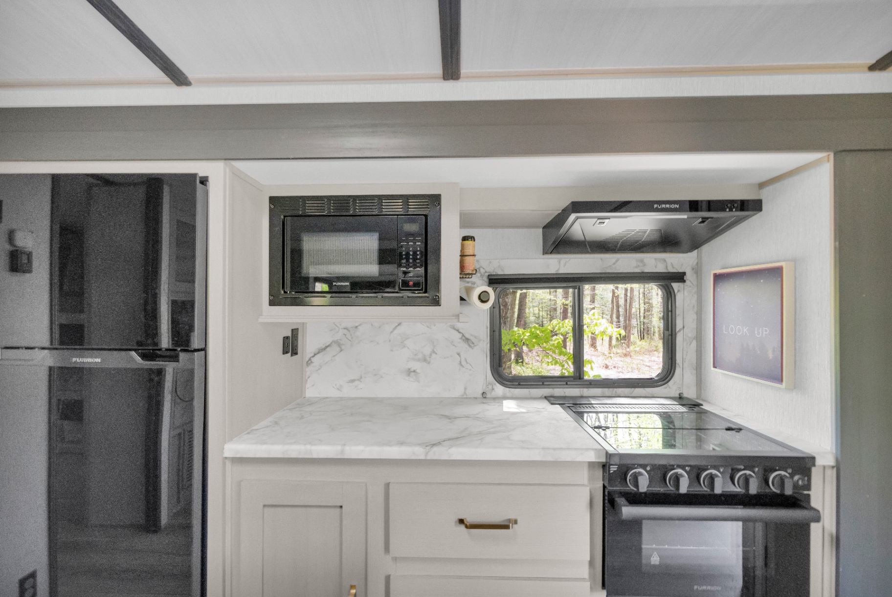 Kitchen with marble counters